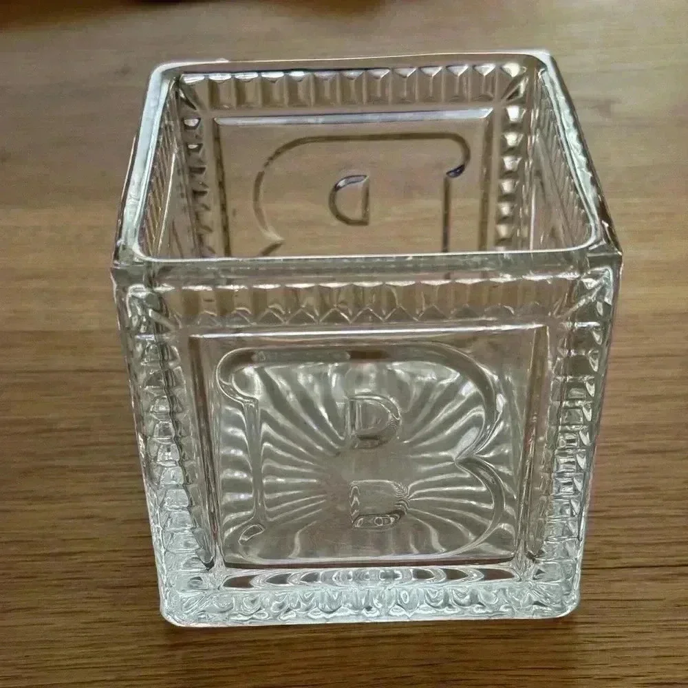 Decorative Glass Vase 3.5”x 4”, letters on outside spell BABY.
